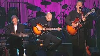 Richard Wright (left), Billy Corgan of the Smashing Pumpkins (center) and David Gilmour perform "Wish You Were Here" at the 1996 Rock & Roll Hall of Fame Induction Ceremony. 