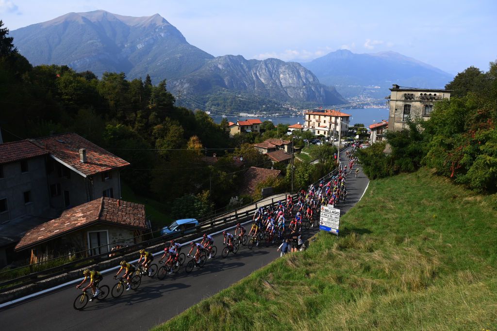 COMO ITALY OCTOBER 08 A general view of the Peloton compete passing through Bellagio village climbing to the Madonna del Ghisallo 758m during the 116th Il Lombardia 2022 a 253km one day race from Bergamo to Como iLombardia on October 08 2022 in Como Italy Photo by Tim de WaeleGetty Images