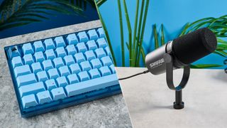 A Corsair K65 Plus Mac in blue on the left of the image, with a Shure MV7i microphone on the right