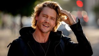 Chad Michael Murray running a hand through his long hair in Freakier Friday.