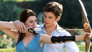 Chris Pine and Anne Hathaway doing archery in Princess Diaries 2