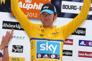 Bradley Wiggins extended his lead in the Dauphine after a smashing time trial