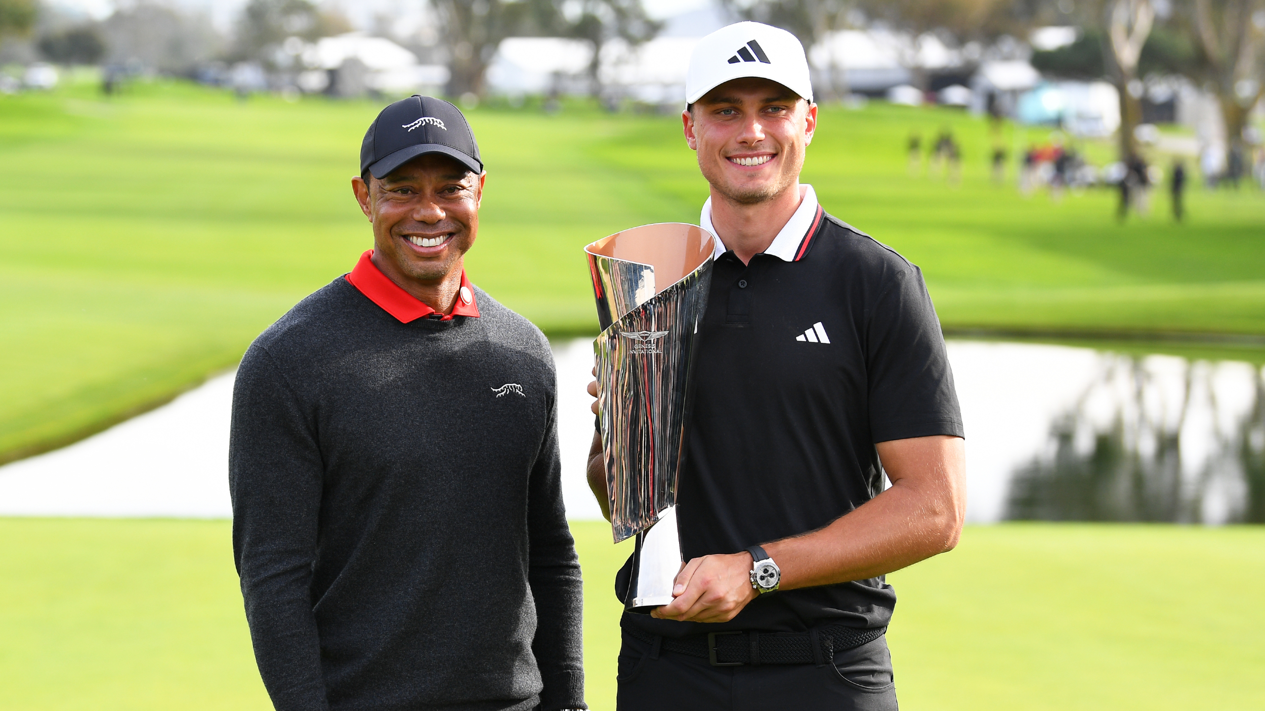 Tiger Woods and Ludvig Aberg with the Genesis Invitational trophy 