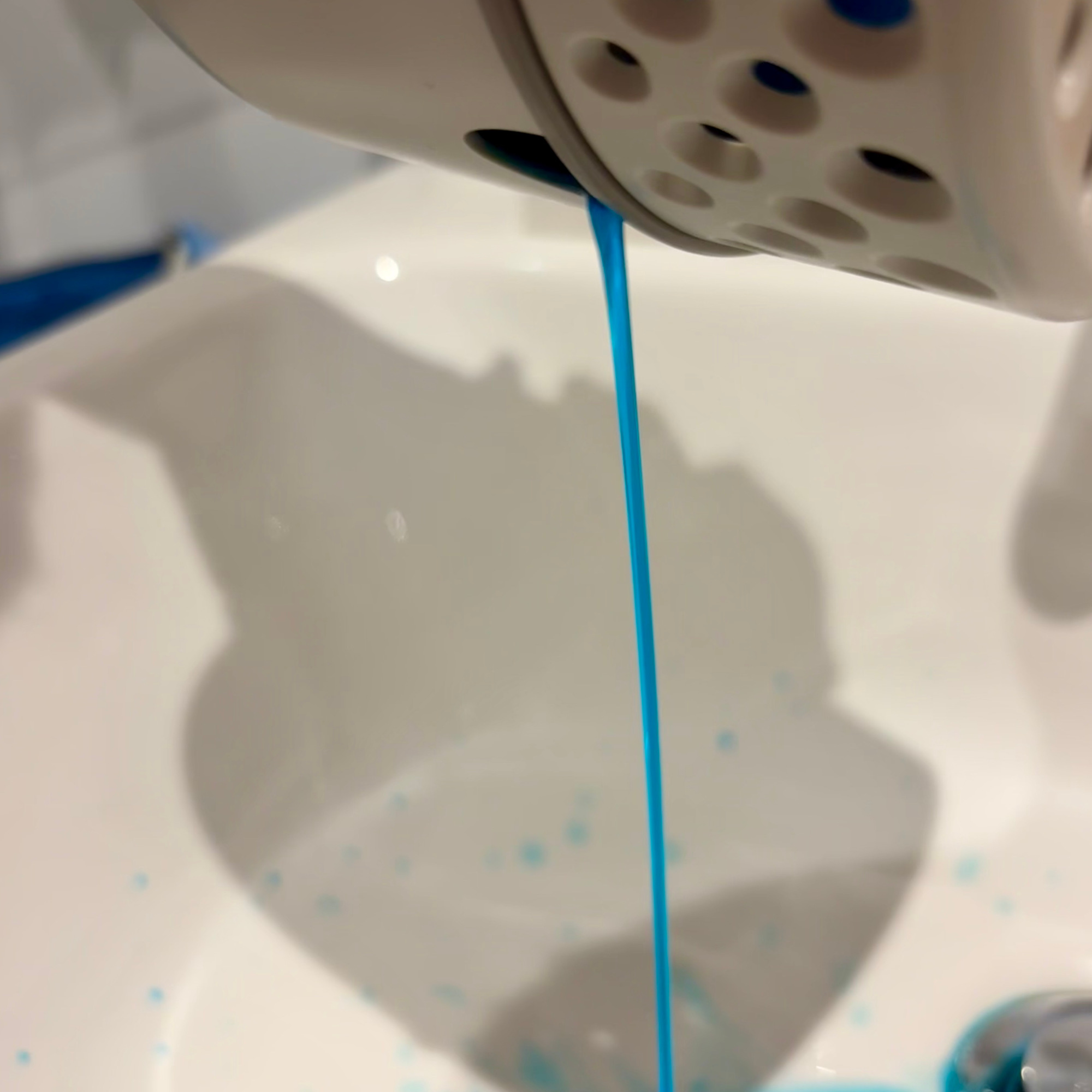 water pouring out of the spout of minky damp guard moisture absorber