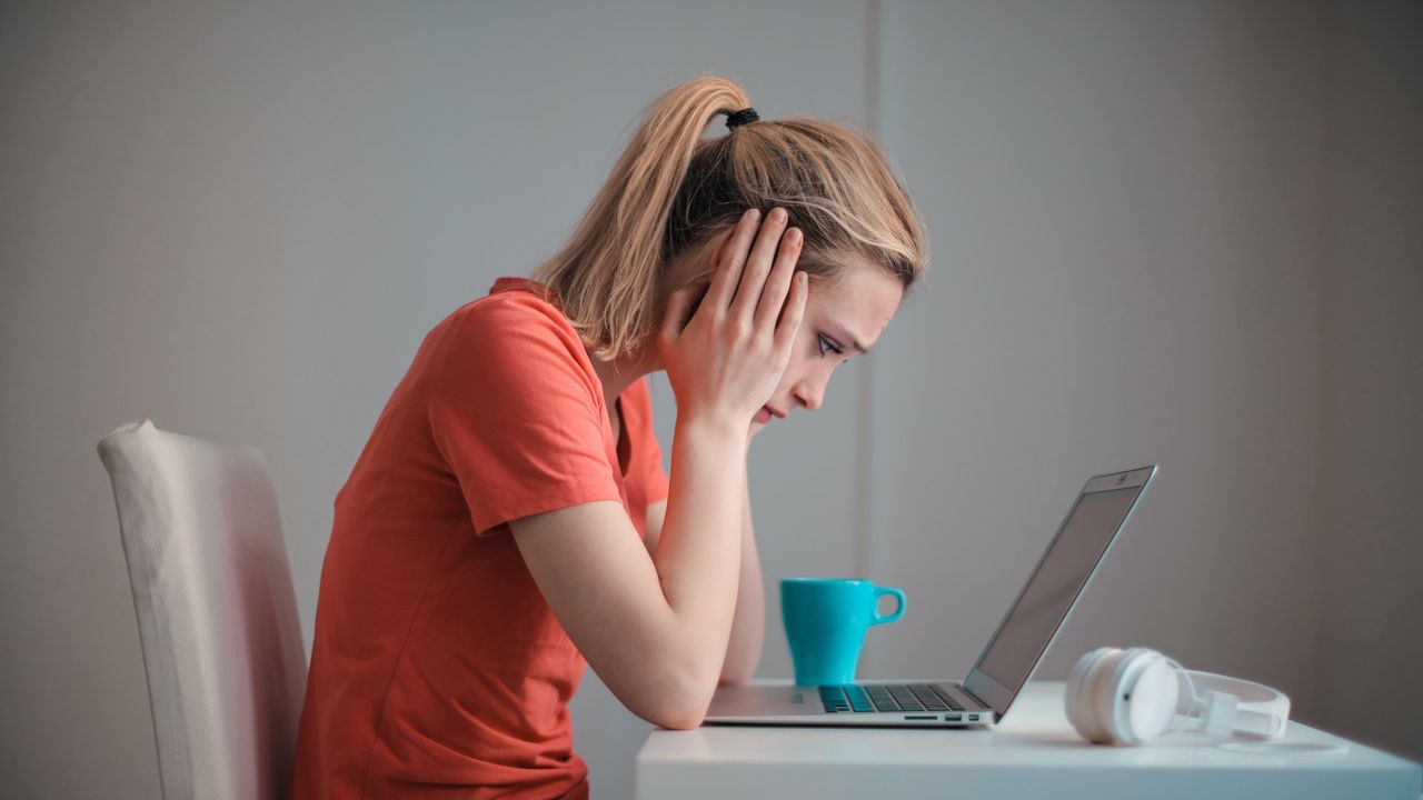 Laptop user looking worried