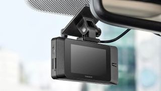 Thinkware ARC dash cam on a car windshield