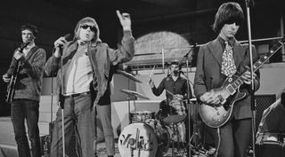 (from left to right) Paul Samwell-Smith, Keith Relf, Jim McCarty and Jeff Beck of The Yardbirds perform on the television show Ready Steady Go! in London on May 27, 1966
