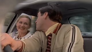 Truman and Meryl go for a nervous ride in The Truman Show.