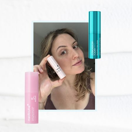 a balm skincare background with a framed photo of a girl with brown-blonde hair holding a pink serum stick with two oversized pink and blue serum sticks next to her