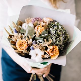 Bouquet of dried flowers including roses and hydrangeas