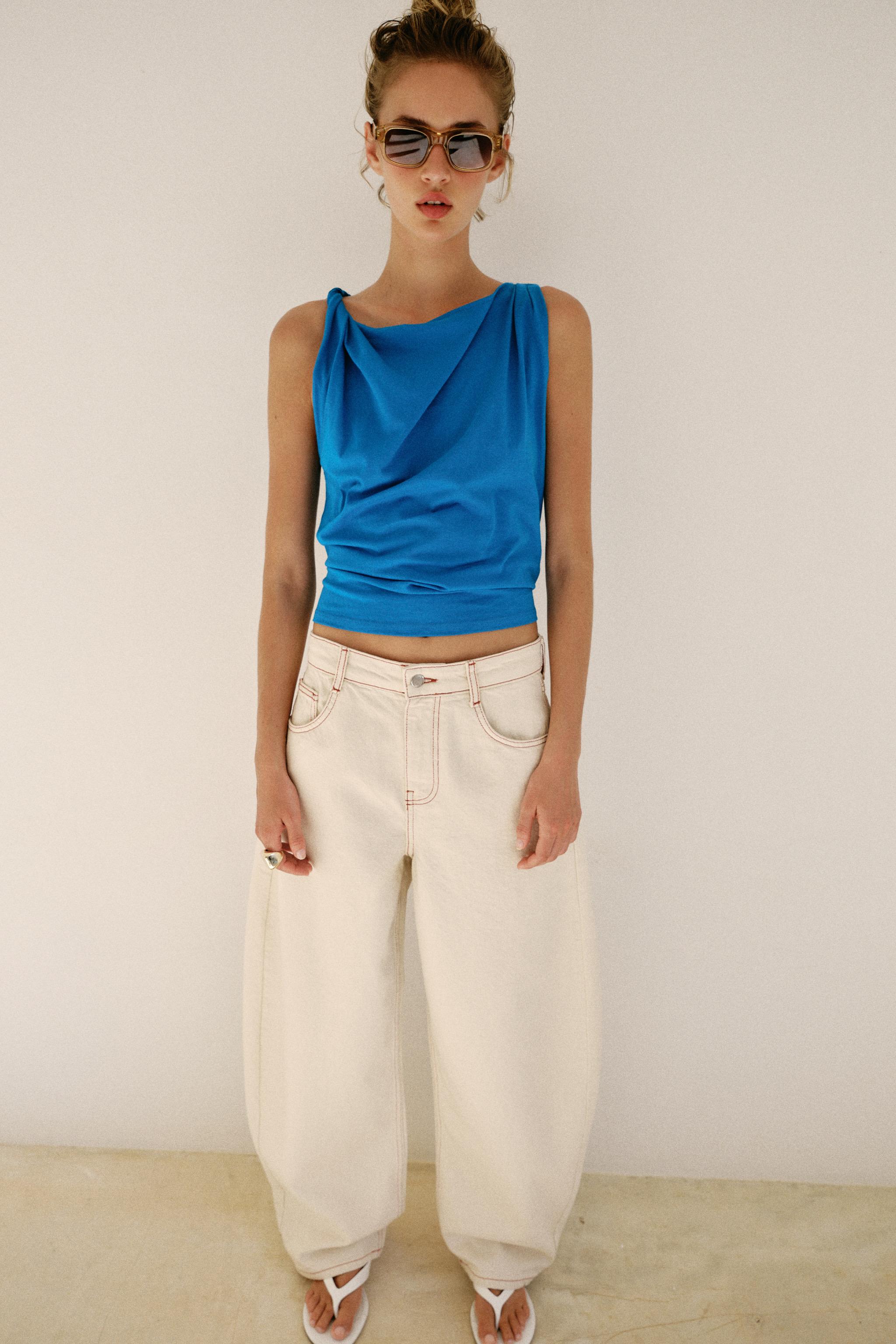 Draped sleeveless top