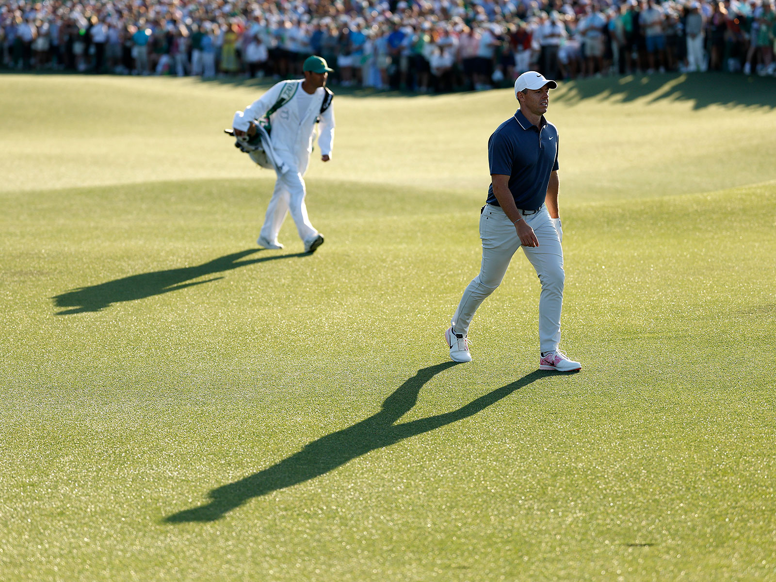 Rory McIlroy walking up to the 18th green at Augusta National