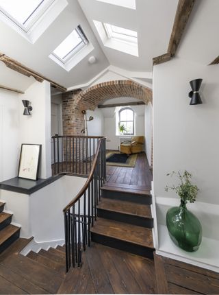staircase with landing lighting in renovated house