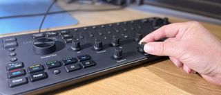 Best keyboard for video editing: Hand tweaking knob on the Loupedeck+ console