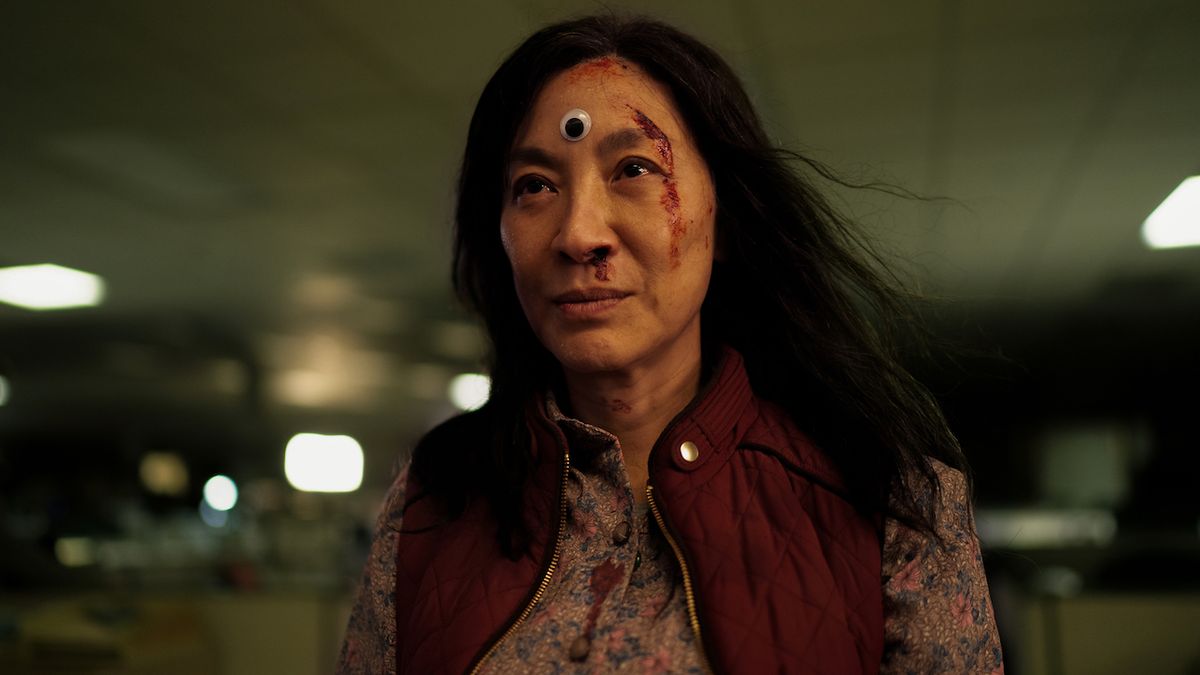 Michelle Yeoh as Evelyn with googly third eye in Everything Everywhere All At once