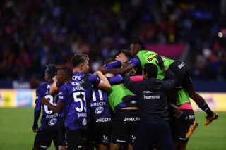Independiente del Valle players celebrate a goa against Orense in June 2024.