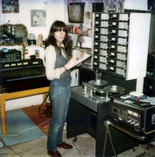 Cosey Fanni Tutti standing in a music studio