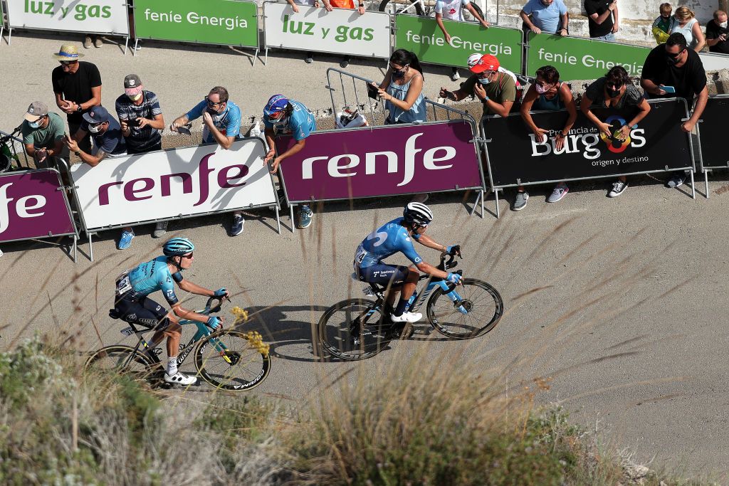 ALTO DE LA MONTAA DE CULLERA SPAIN AUGUST 19 LR Aleksander Vlasov of Russia and Team Astana Premier Tech and Miguel ngel Lpez Moreno of Colombia and Movistar Team climbing the Alto de la Montaa de Cullera 184m while fans cheer during the 76th Tour of Spain 2021 Stage 6 a 1583km stage from Requena to Alto de la Montaa de Cullera 184m lavuelta LaVuelta21 on August 19 2021 in Alto de la Montaa de Cullera Spain Photo by Gonzalo Arroyo MorenoGetty Images