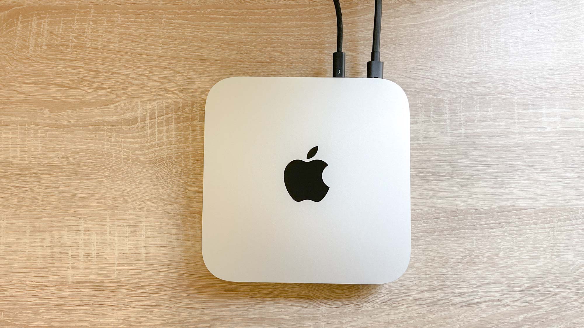 Mac mini M2 on a desk, viewed top-down