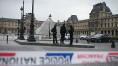 Police patrol outside the Louvre after jewel heist