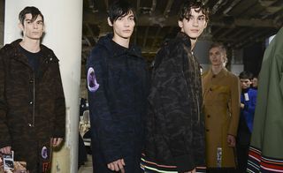 Male models wearing coats