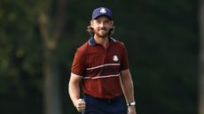 Tommy Fleetwood fist pumps at the Ryder Cup