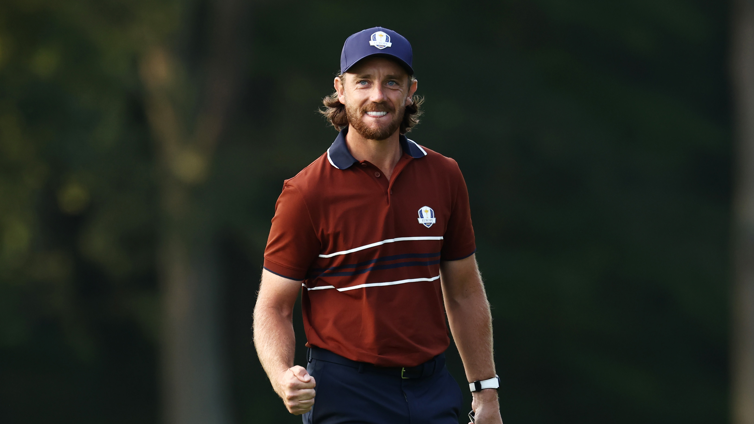 Tommy Fleetwood fist pumps at the Ryder Cup