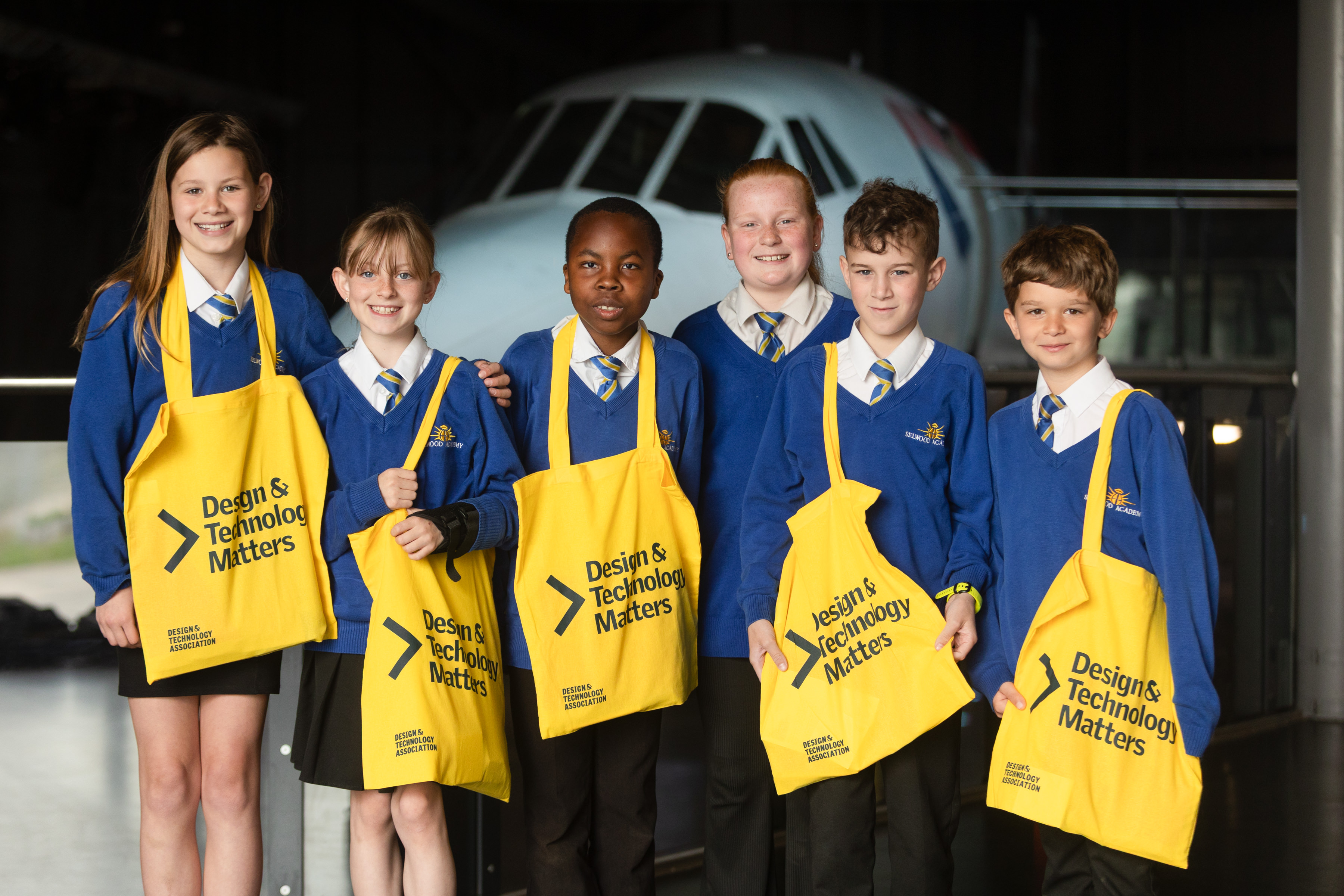 school kids with design and technology tote bags