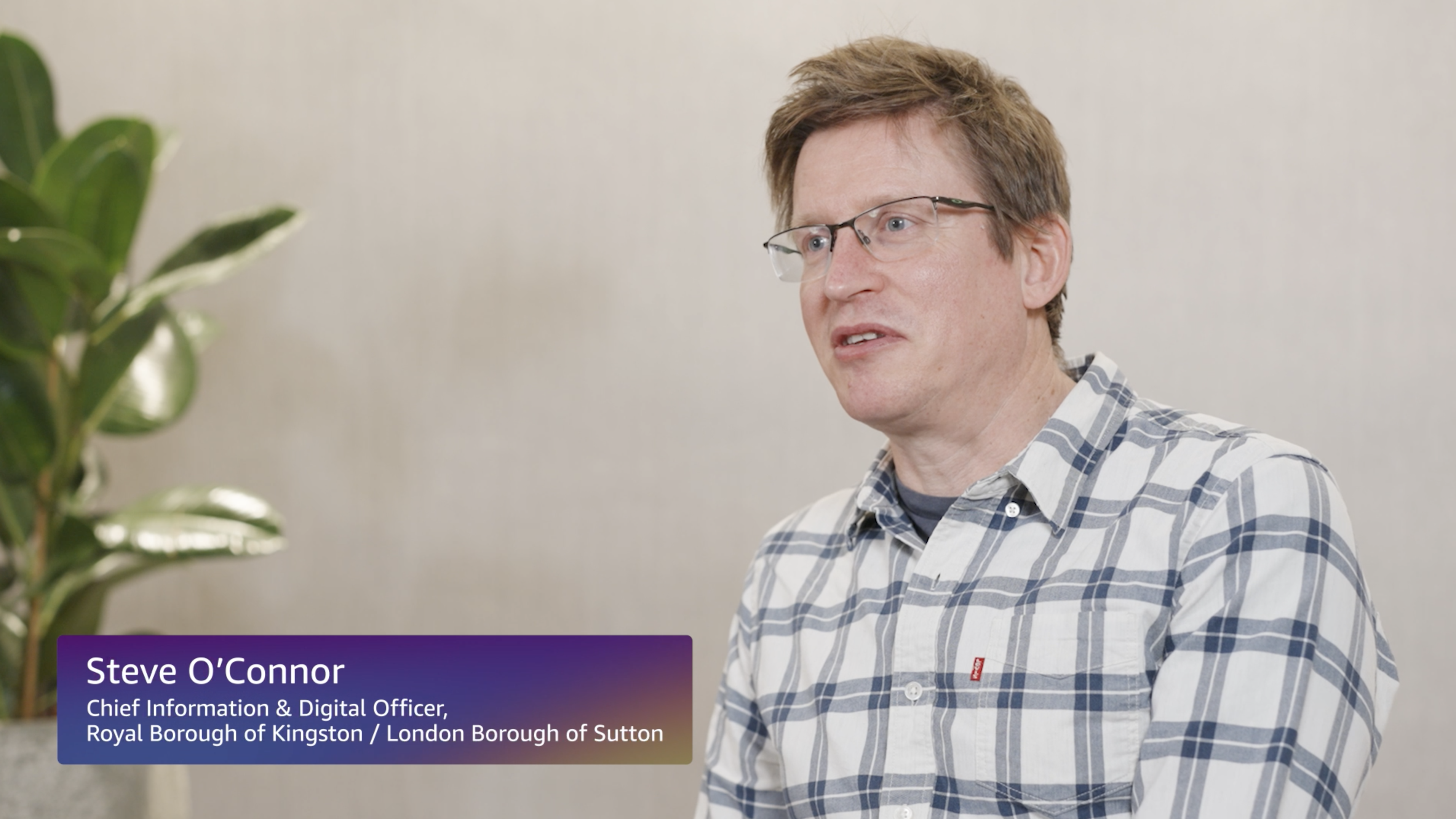 A still from a video of Steve O'Connor, chief information and digital officer at the Royal Borough of Kingston and London Borough of Sutton, speaking about his organizations' use of AWS