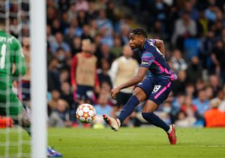 Christopher Nkunku scores against Manchester City