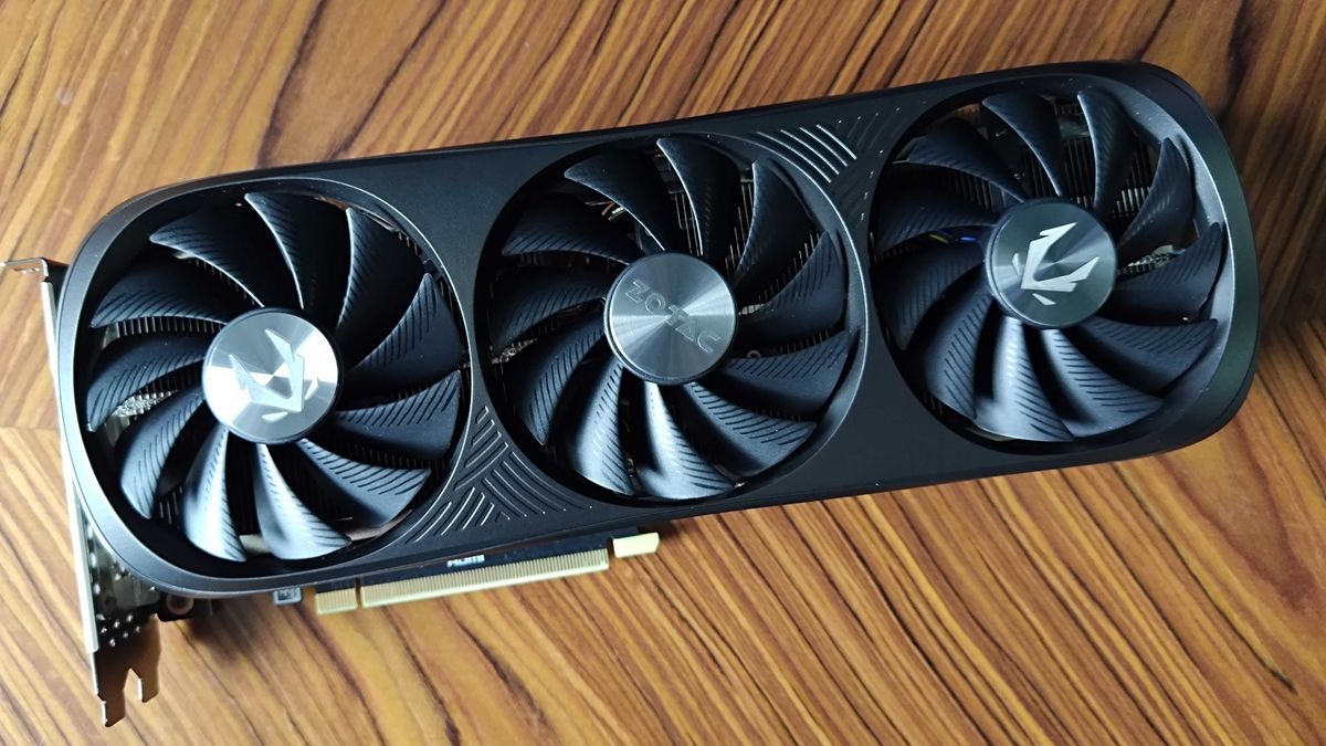 Birdseye view of Nvidia GeForce RTX 4070 Super lying on woodgrain table