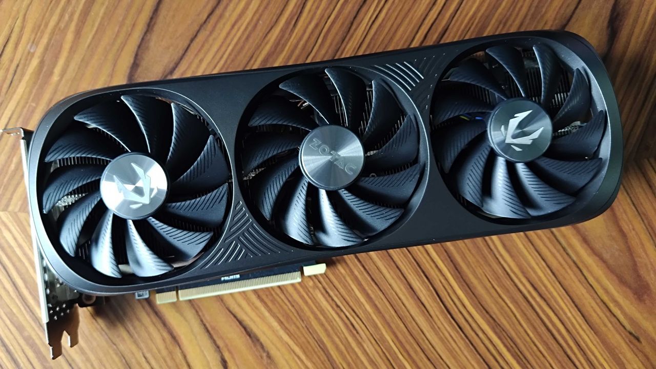 Birdseye view of Nvidia GeForce RTX 4070 Super lying on woodgrain table