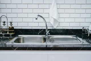 shiny stainless steel kitchen sink