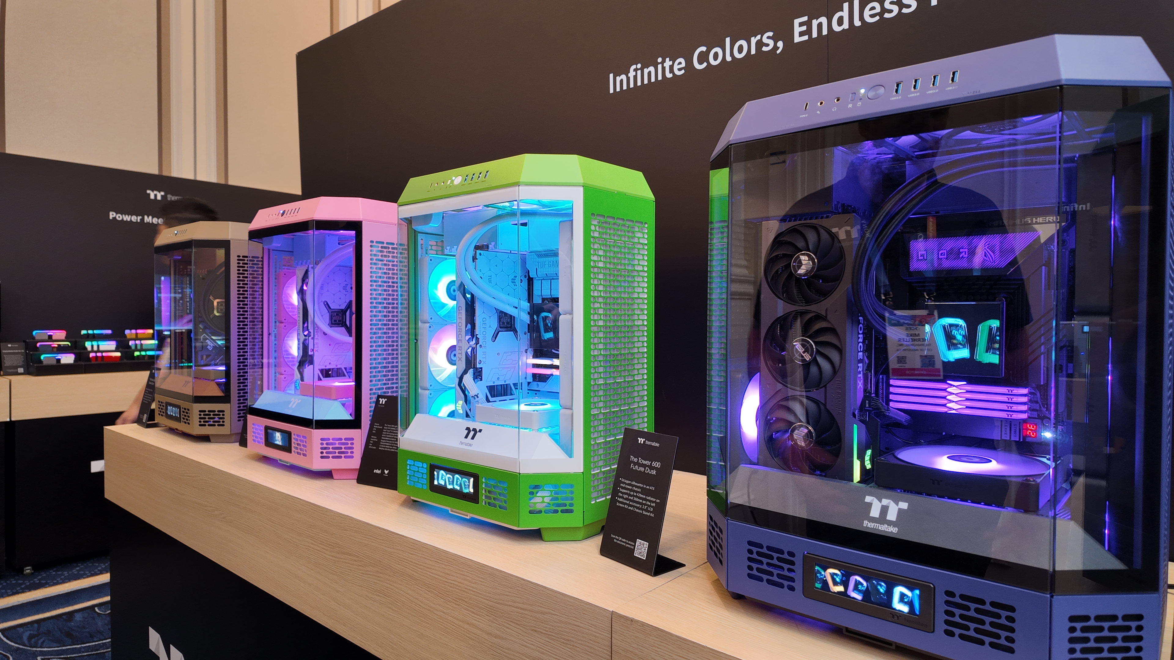 Thermaltake's brightly coloured PC cases at its CES 2025 booth.