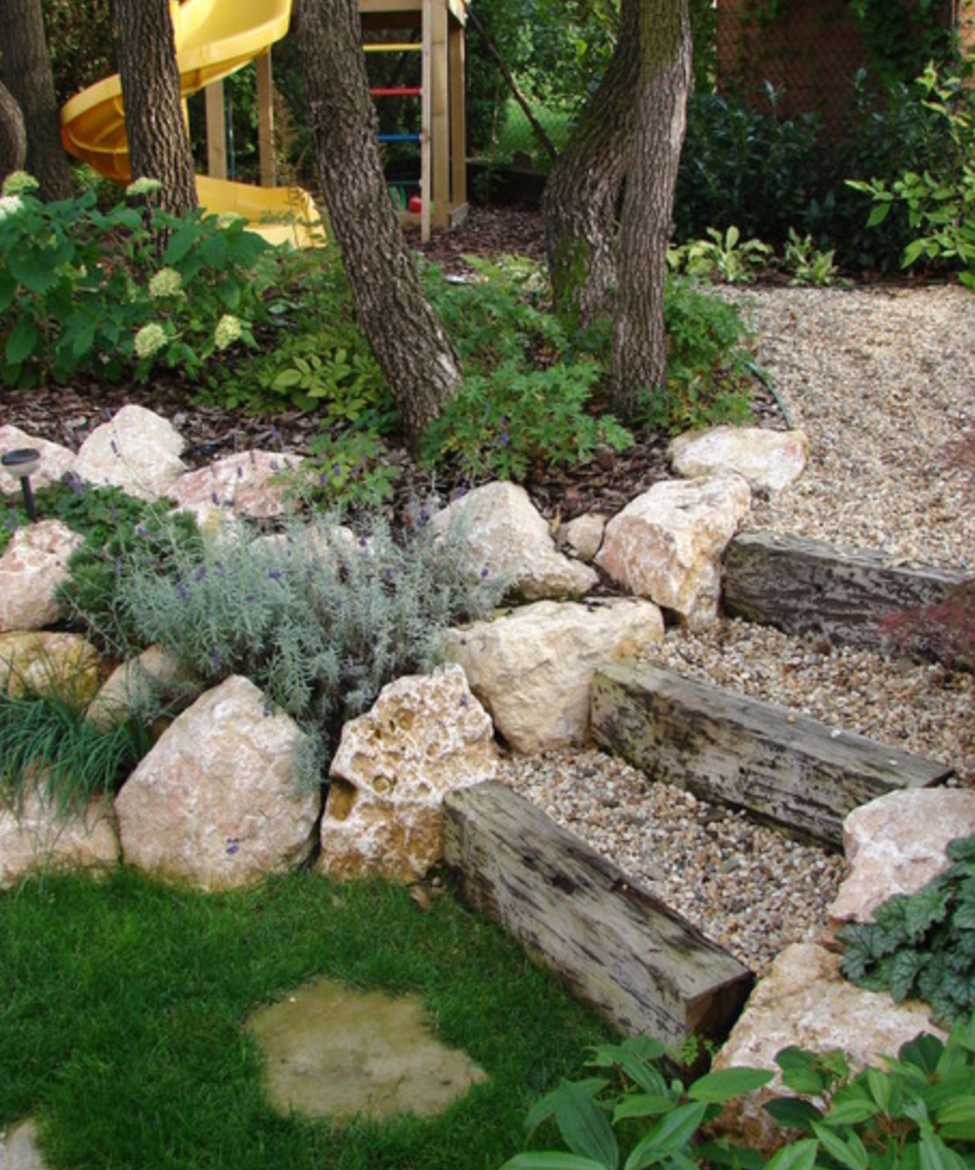 A sloped rock garden with steps