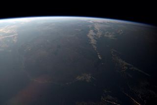 Hazy sunset over Madagascar from ISS