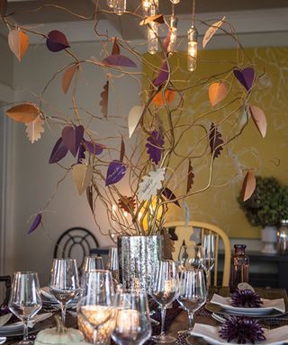 A thanksgiving tree centerpiece with leaf card personalized placecards