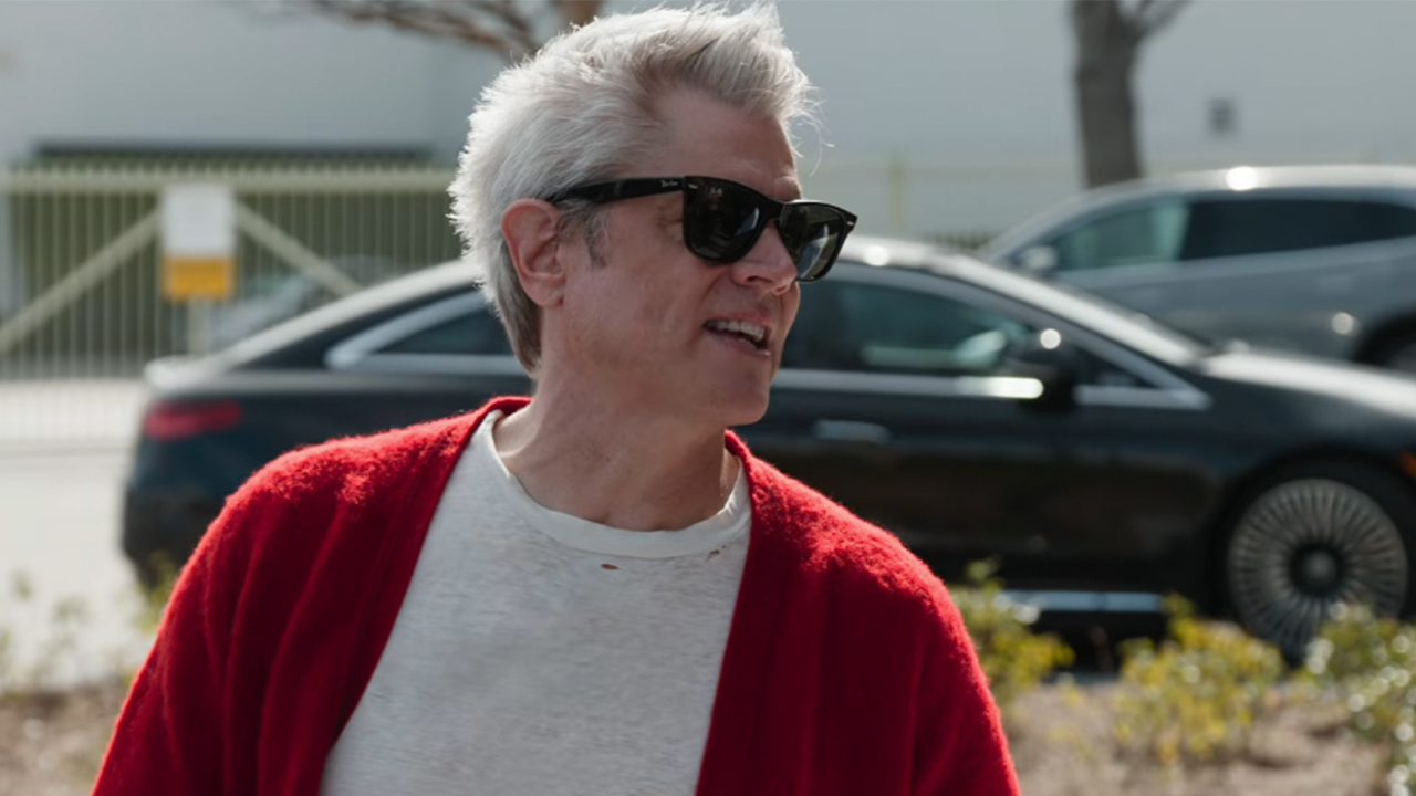 Johnny Knoxville looking to side while wearing sunglasses in Jackass: Best and Last