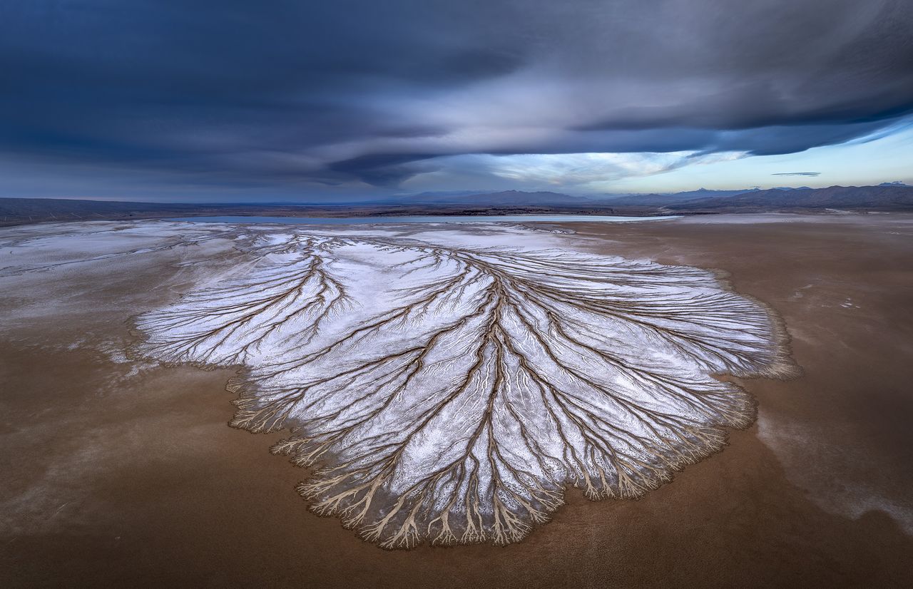 Aerial view on Desert Playa with a stormy sky filled with dark clouds