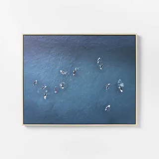 Framed print of a group of surfers from above