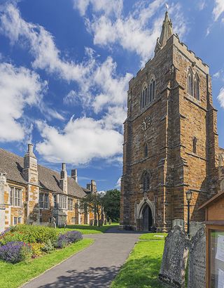 Lyddington: The imposing parish church and the palace range