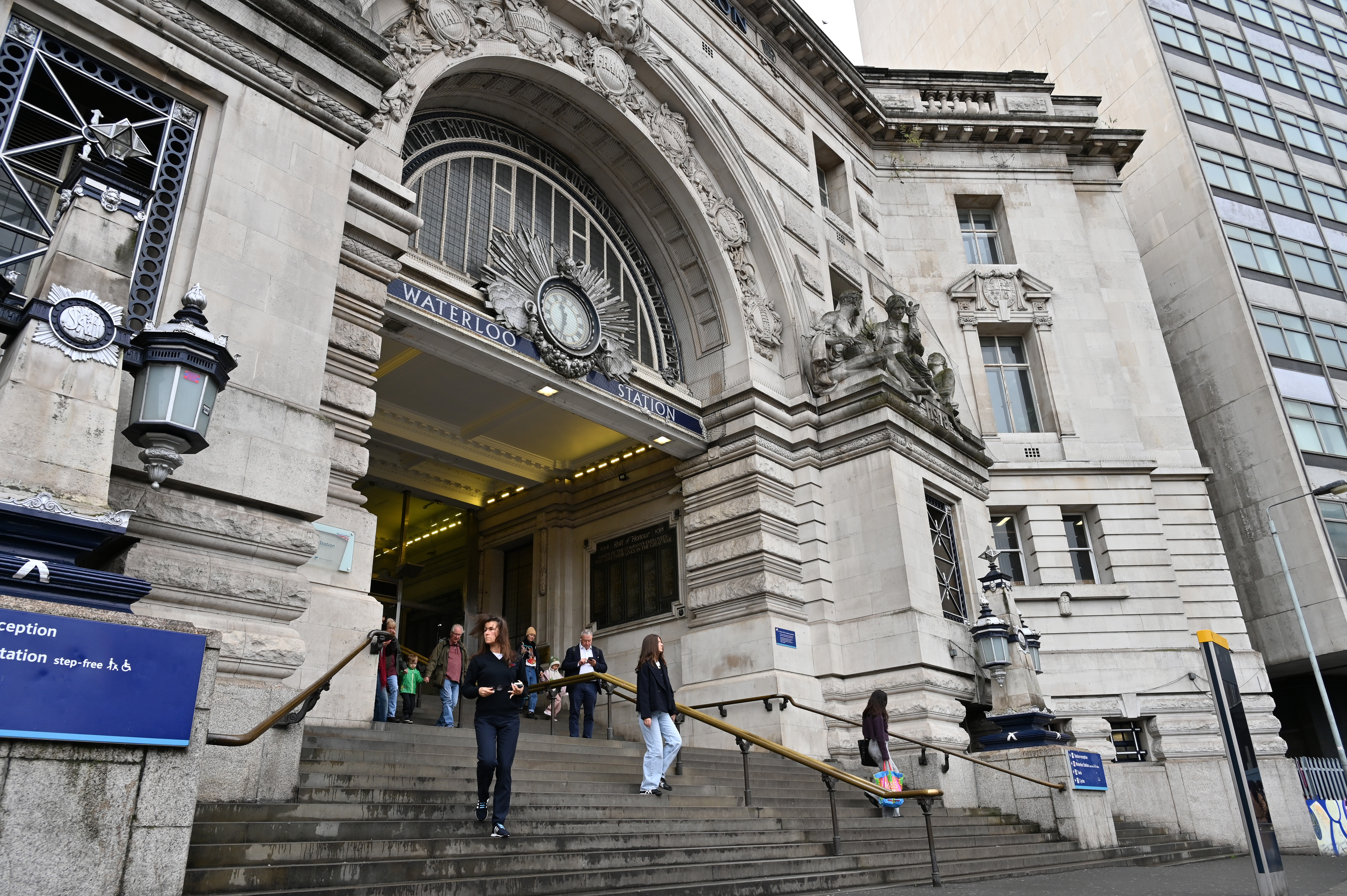 LONDON - NOVEMBER 10: A general exterior view of the Waterloo Station victory arch entrance as people enter and exit the station on November 10, 2025 in London, United Kingdom.
