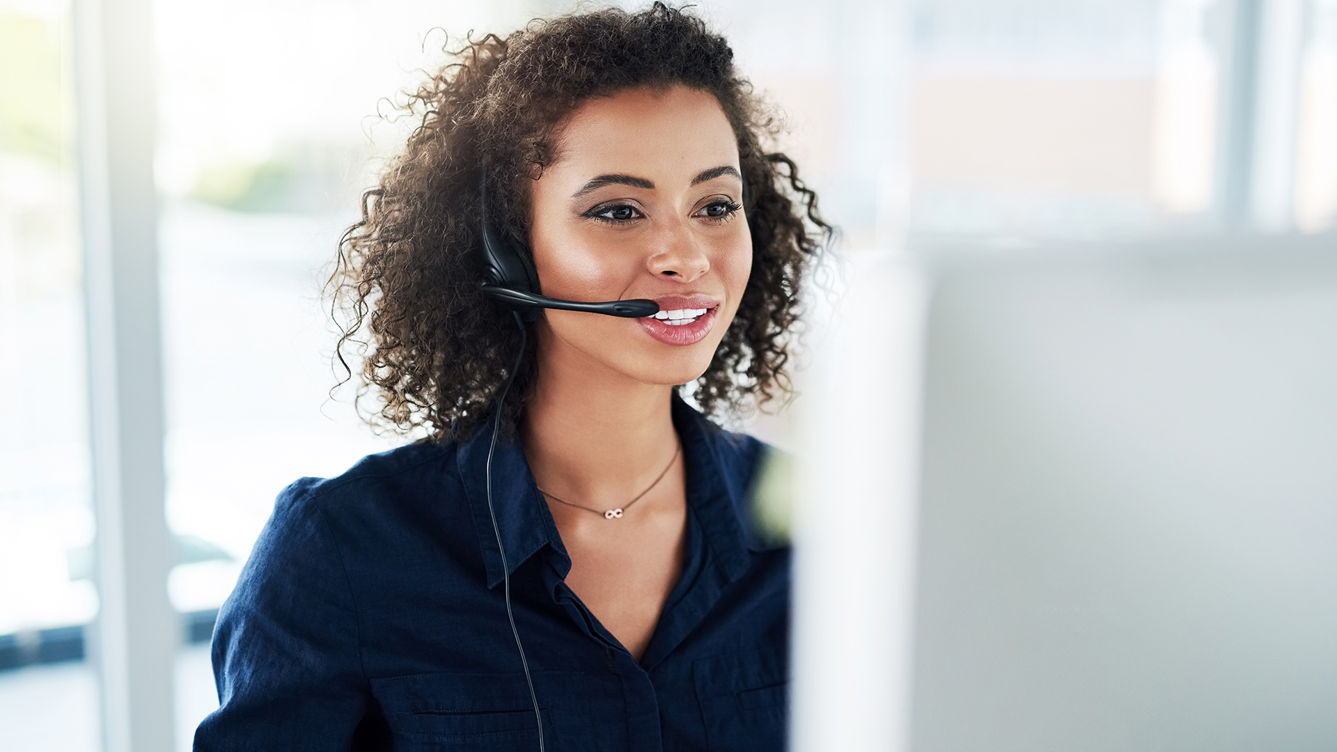 A woman making a sales call in an office