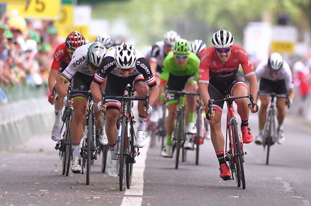 Michael Matthews holds off Peter Sagan and John Degenkolb for the win and leader's jersey