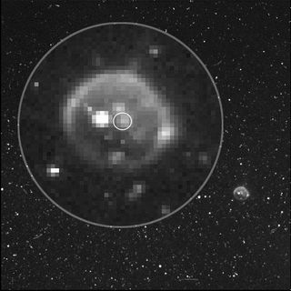 Juno's Stellar Reference Unit camera, which helps the spacecraft navigate by the stars, captured this image of a faintly lit Io. The plume is highlighted by the small circle.