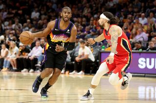 Chris Paul #3 of the Phoenix Suns handles the ball against Jose Alvarado #15 of the New Orleans Pelicans during the first half of Game One of the Western Conference First Round NBA Playoffs at Footprint Center on April 17, 2022 in Phoenix, Arizona.