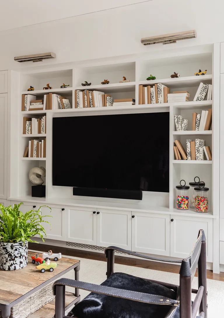 coordinated bookshelves in media room