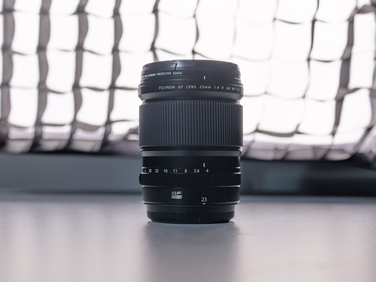 A photo of a Fujifilm lens backlit with a softbox