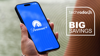 Person holding smartphone with Paramount Plus logo displayed, with overlay of TechRadar's radar and 'big savings' messaging