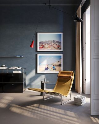 A living room with a grey wall and a yellow chair